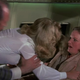 Illustration for article titled ‘Screaming Woman’ Removed From Flight After Hitting a Passenger and Kissing a Flight Attendent